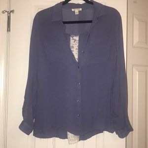 blue blouse with lace detail on the back